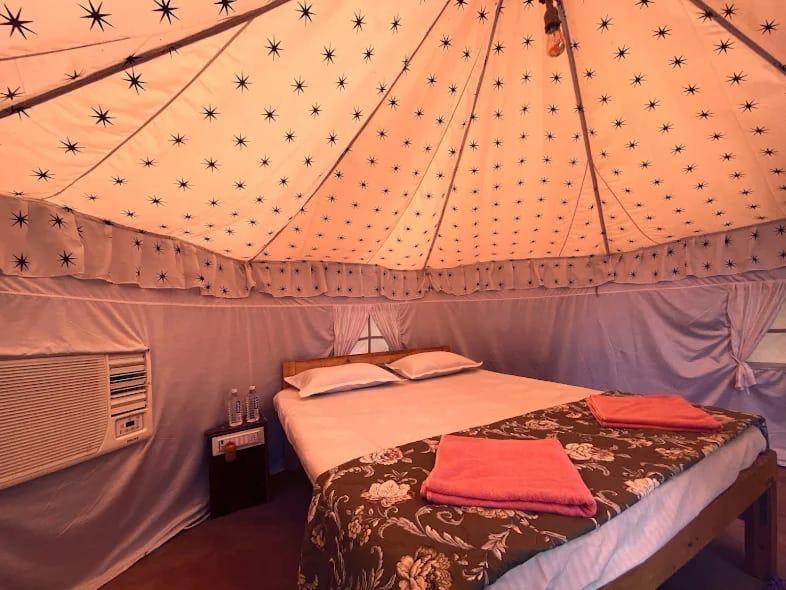 Luxury glamping tent interior at Riverbells